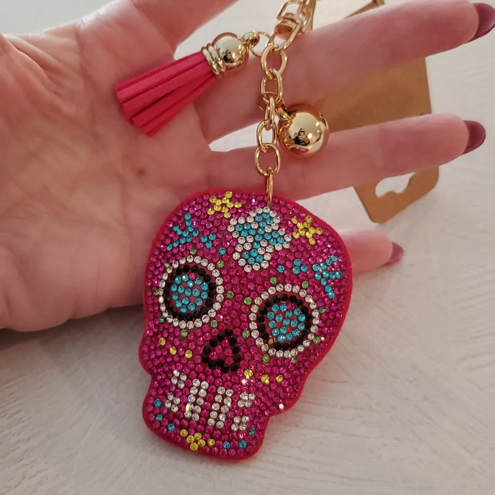 Pink sugar skull puffy keychain multicolored rhinestones ball tassel